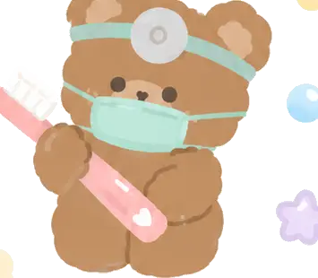 Crumbs the brown bear holding a toothbrush beside a dentist tray